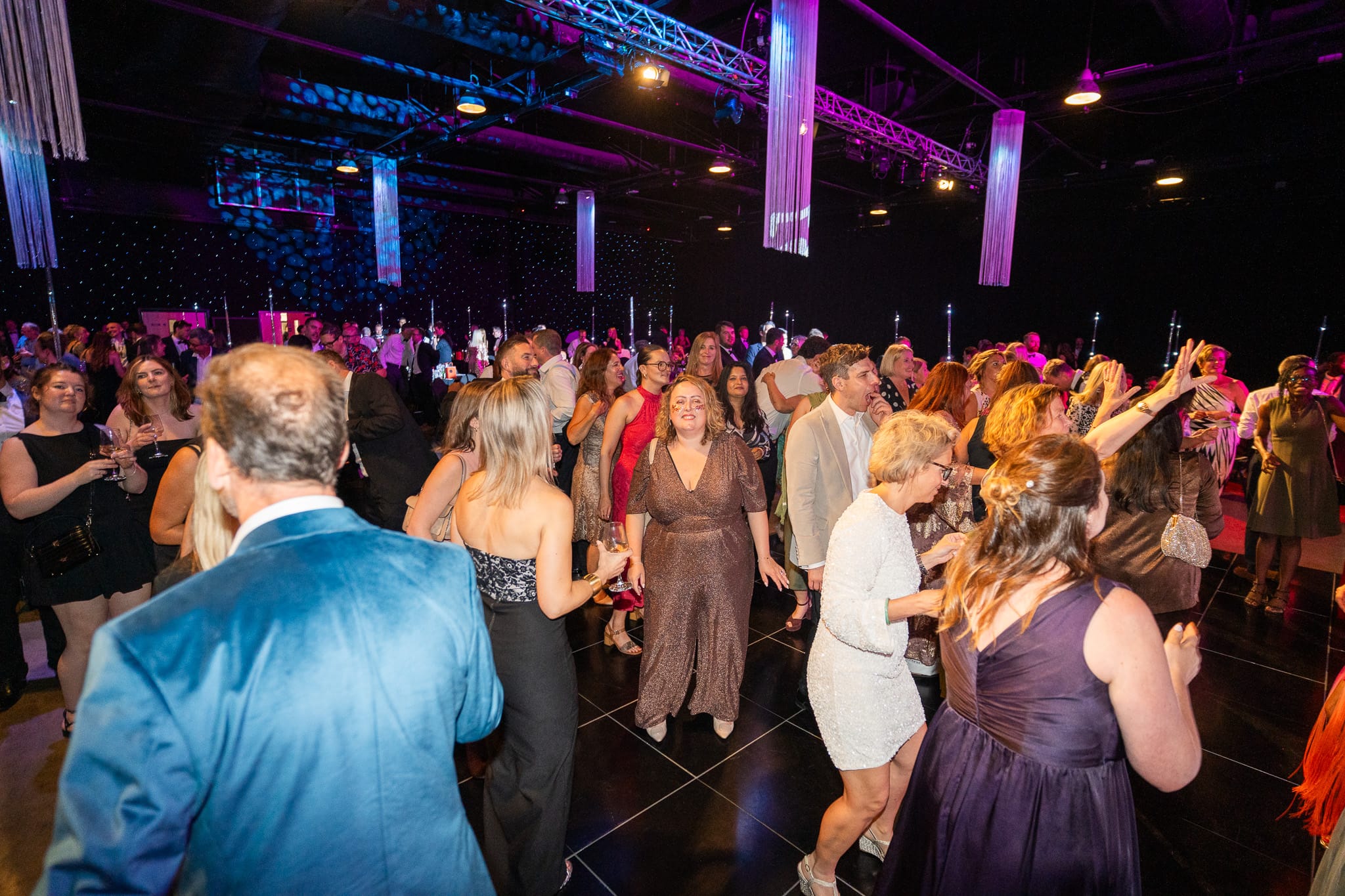 Guests filling the dance floor during the live music